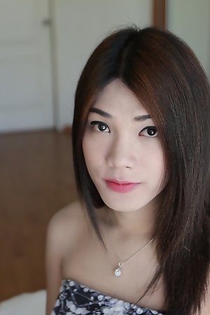 20 year old Thai ladyboy stripping for white tourist